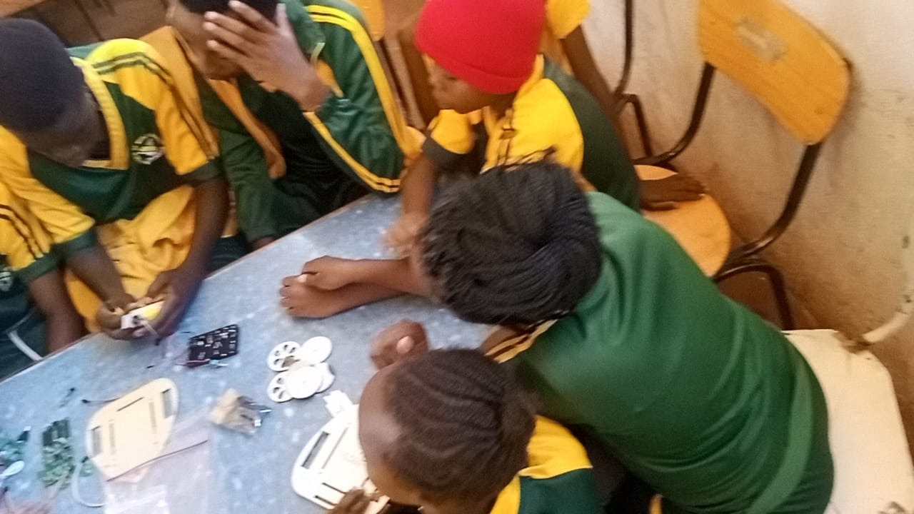 Learners exploring an electronics club activity